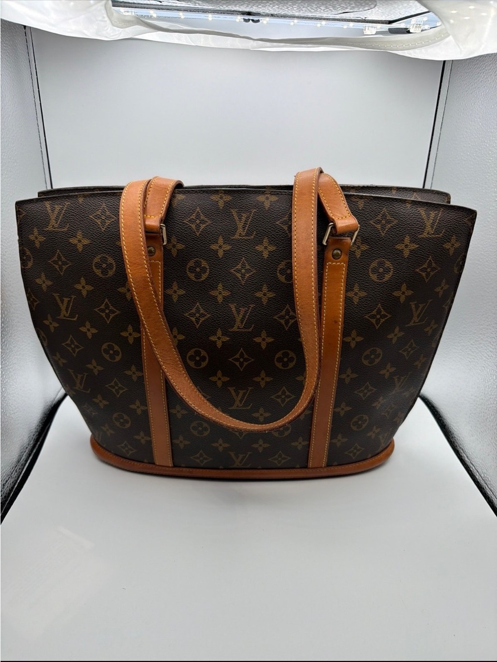 Louis Vuitton Babylon mm Monogram Canvas Tote in Brown with Tan Leather Trim